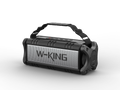 Rugged black and silver portable 90W waterproof wireless Bluetooth speaker with a convenient carry strap.