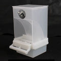 Translucent white plastic bird feeder with a small perch and a metallic wing nut fastener on a black background.