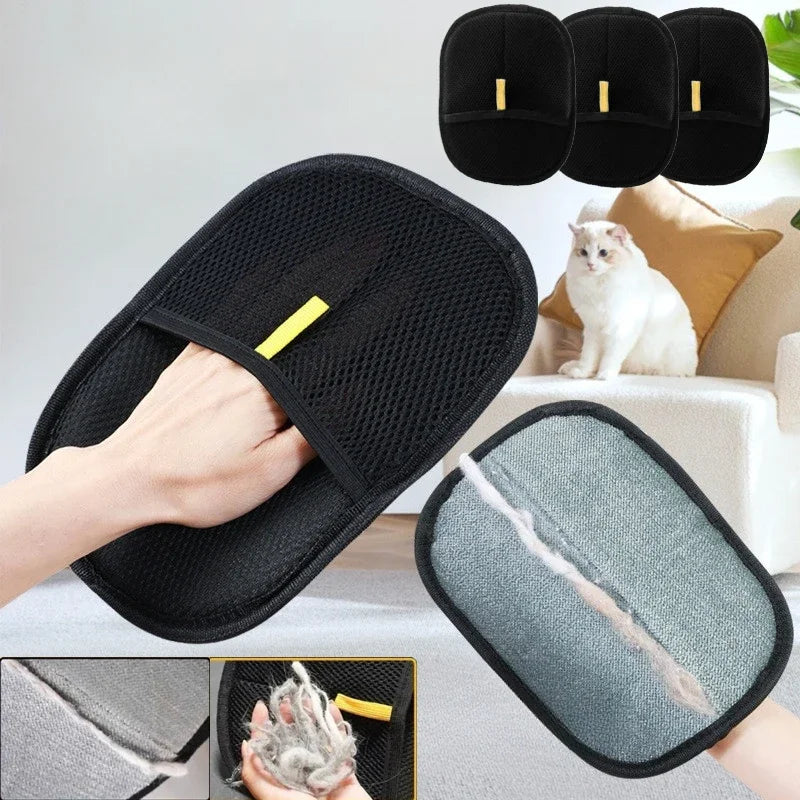 Black pet hair removal mitt with a grey cleaning surface and yellow strap, shown removing fur from fabric.
