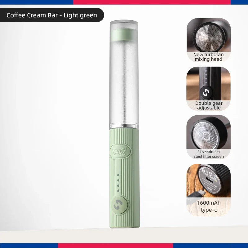 Light green portable coffee cream mixer with a sleek, ribbed design, turbofan head, and rechargeable USB-C base.