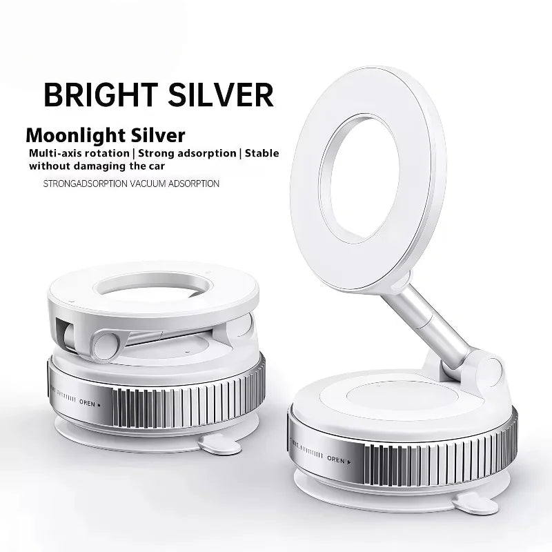 Silver-colored, foldable magnetic car phone holder with a circular mount and adjustable arm.
