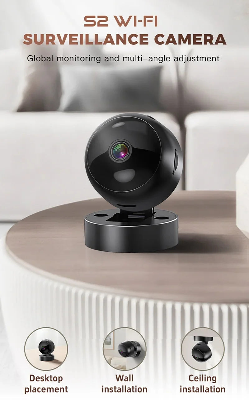 Black 360-degree wireless smart security camera, suitable for desktop, wall, or ceiling mounting.