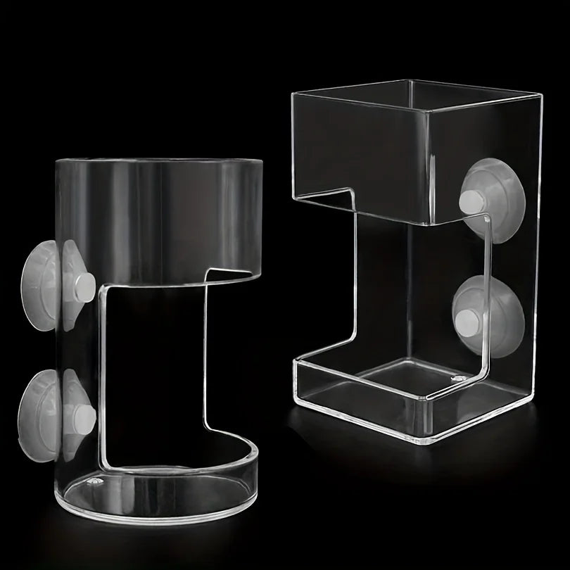 Two clear acrylic wall-mounted bathroom organizers with suction cups, shown in cylindrical and square designs.
