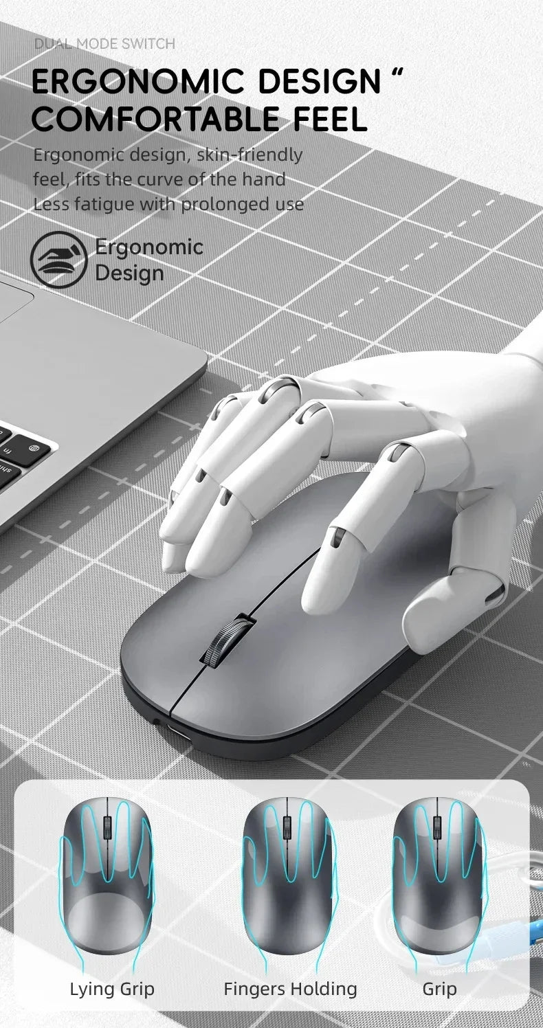 Grey, slim, ergonomic wireless mouse with a scroll wheel, shown being used by a mannequin hand on a grid mat.