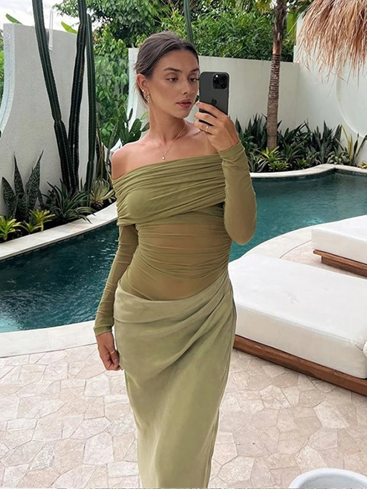 Olive green off-the-shoulder midi dress featuring long sleeves, ruched mesh bodice, and draped wrap skirt.