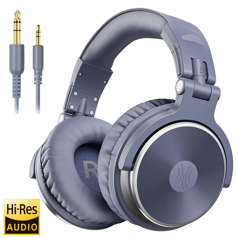 Grey over-ear studio headphones with padded ear cups, foldable design, and included gold-plated wired audio connectors.