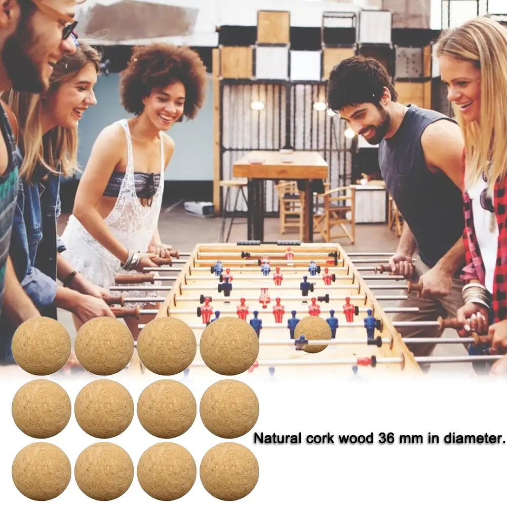 Twelve natural light brown cork foosball balls, 36mm diameter, suitable for standard table football games.