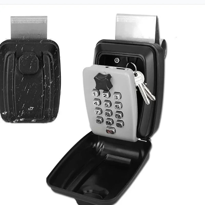 Black metal key lock box with a light grey push-button keypad and metal hanging hook for doors.