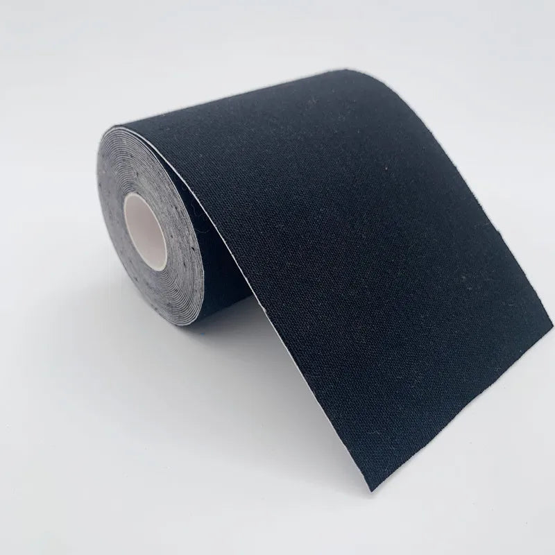 A roll of black kinesiology tape against a plain white background.