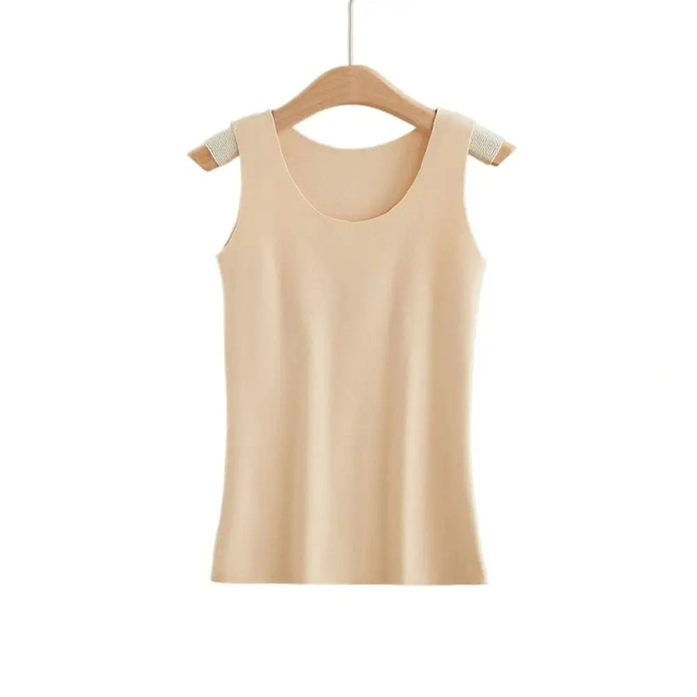 Beige seamless tank top with a scoop neckline, hanging on a wooden hanger.