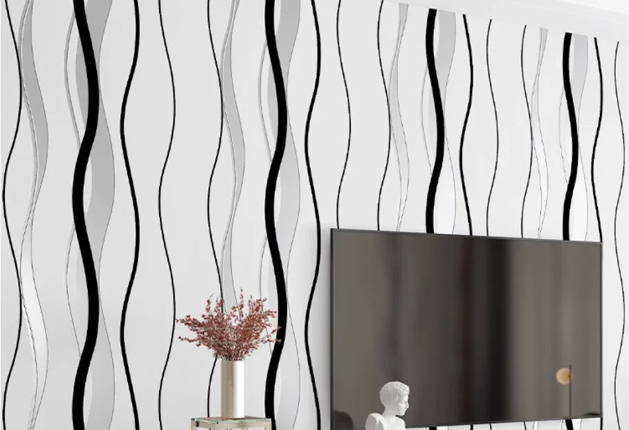 Modern wallpaper featuring sleek, vertical black and grey wavy stripes on a white background.