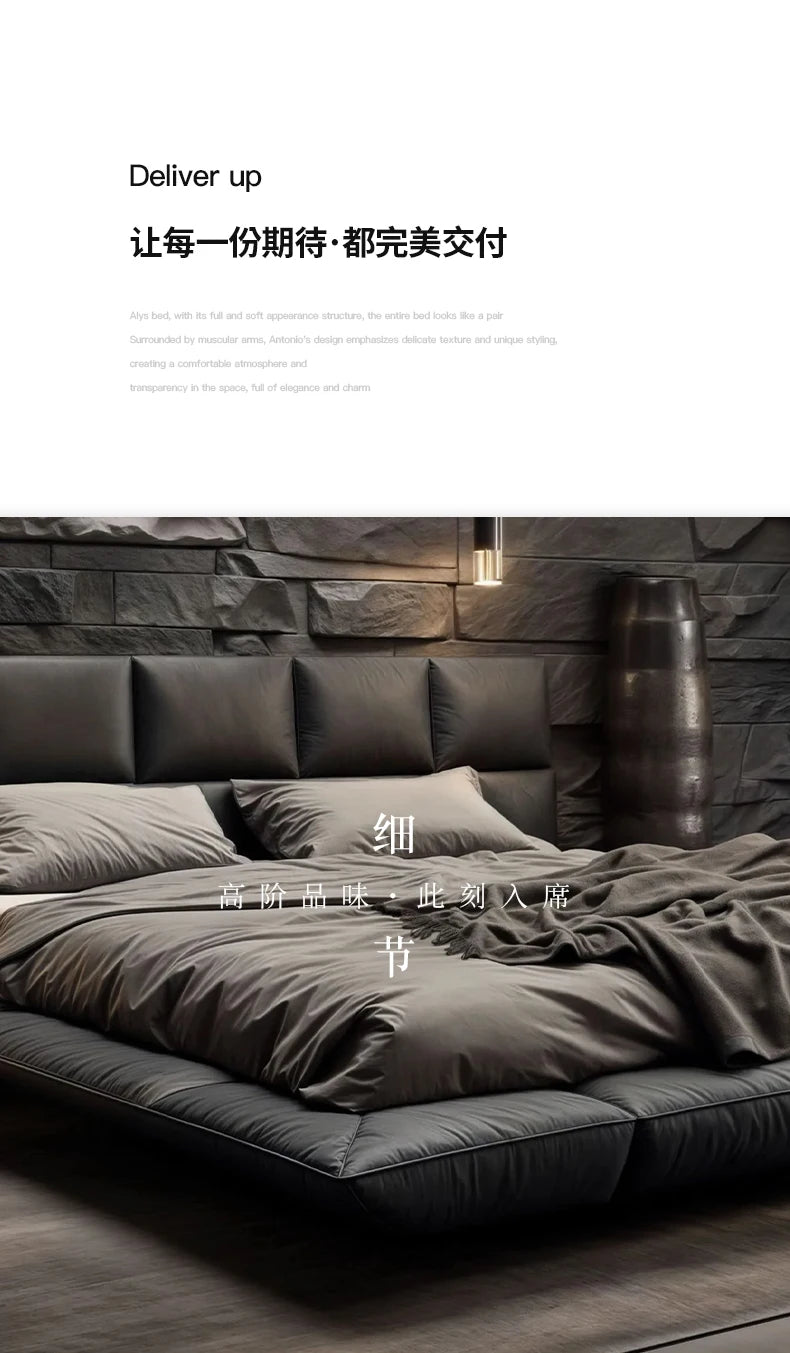 Modern king-size floating bed upholstered in dark grey leather with a cushioned headboard and matching bedding.