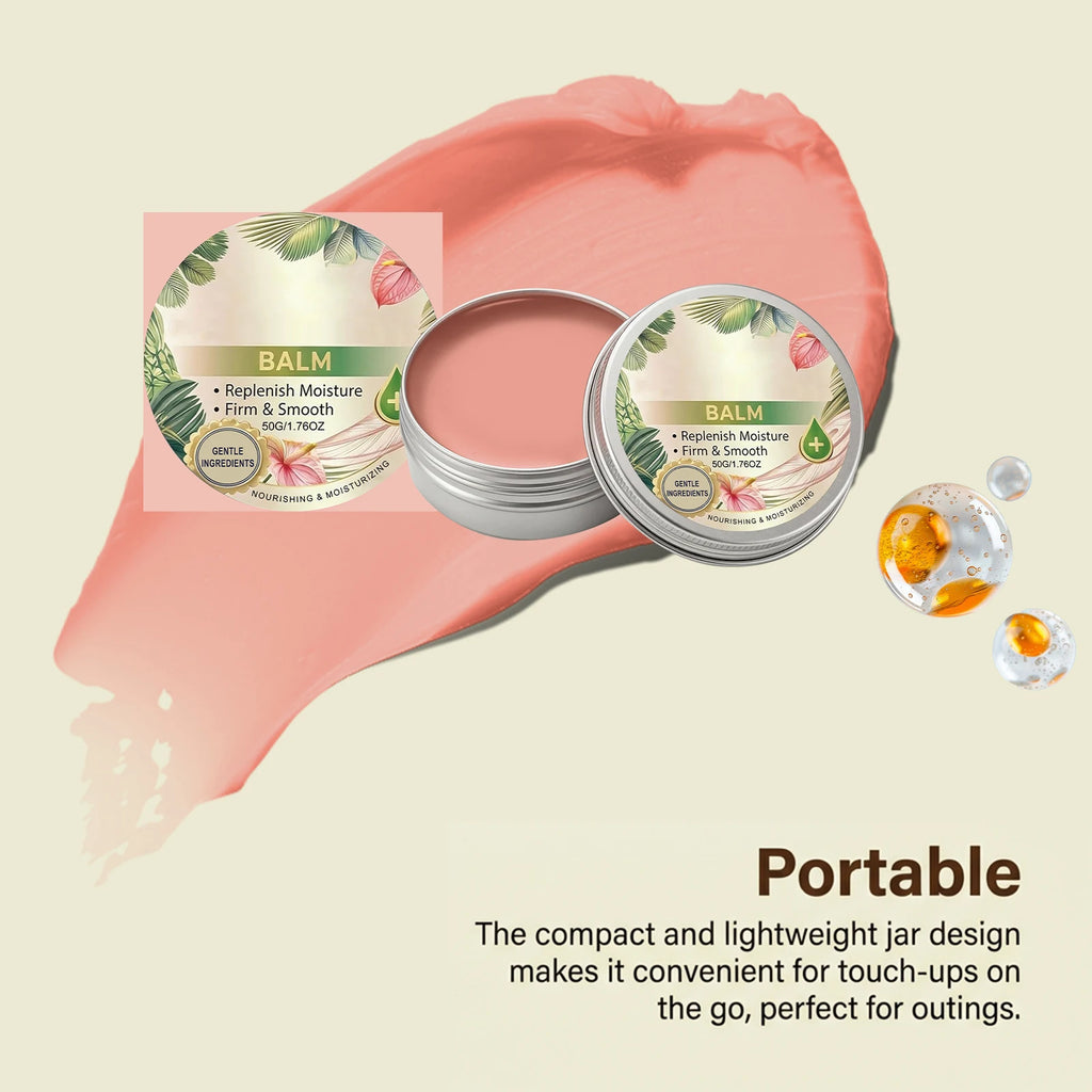Open silver tin containing soft pink nourishing balm with a tropical-themed label, set against a matching balm smear.