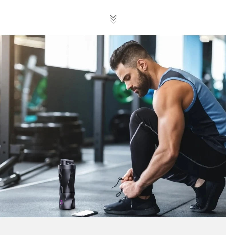 A man tying his shoes in a gym next to a sleek, modern black electric protein shaker bottle.