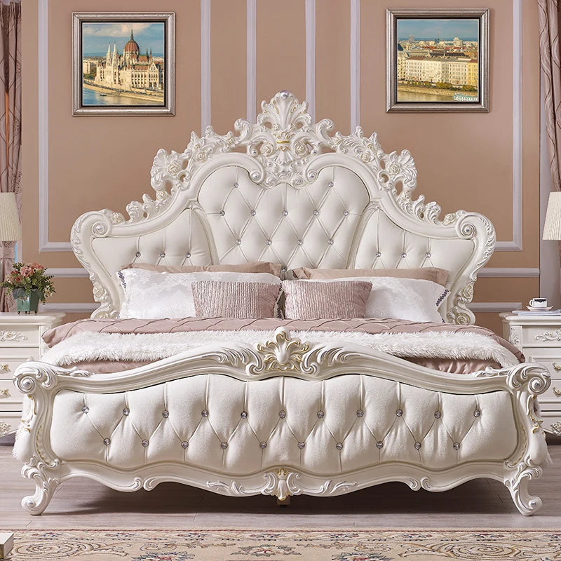 Luxury cream princess bed with an ornate carved frame, tufted white upholstery, and crystal button detailing.