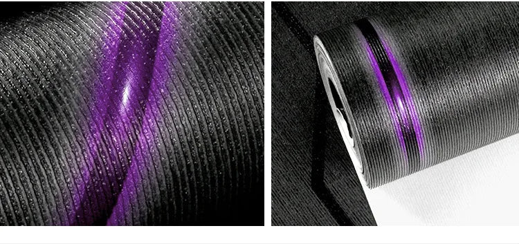 Modern black wallpaper roll featuring a textured vertical ribbed design and a vibrant reflective purple stripe.