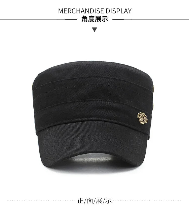 A black cotton military-style cadet cap with a flat top, curved peak and a small decorative metal side badge.