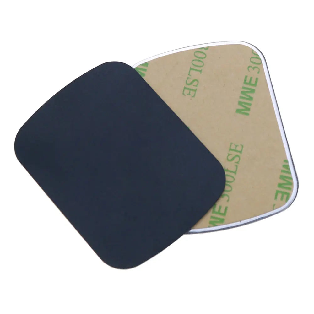 Two square, black metal adhesive mounting plates with rounded corners and paper backings.