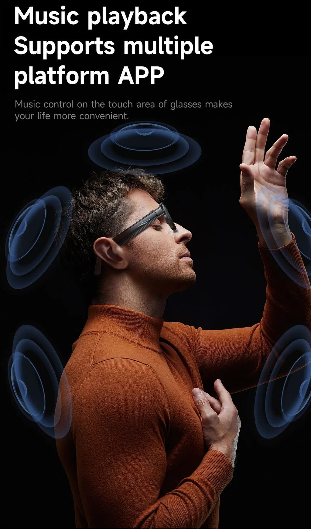 Man in an orange jumper wearing sleek black smart glasses with touch-controlled audio and integrated camera features.