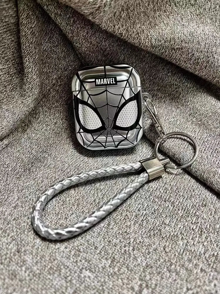 Silver Marvel Spider-Man hard shell case for AirPods with a matching braided wrist strap.