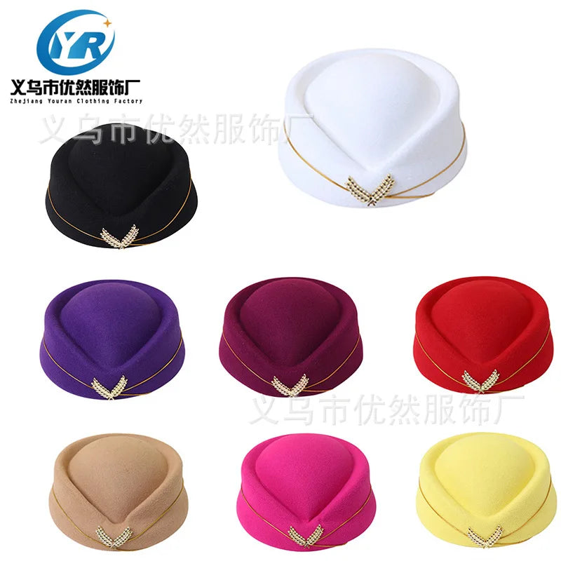 A selection of vintage-style felt pillbox stewardess hats, each featuring a gold metallic laurel leaf detail.