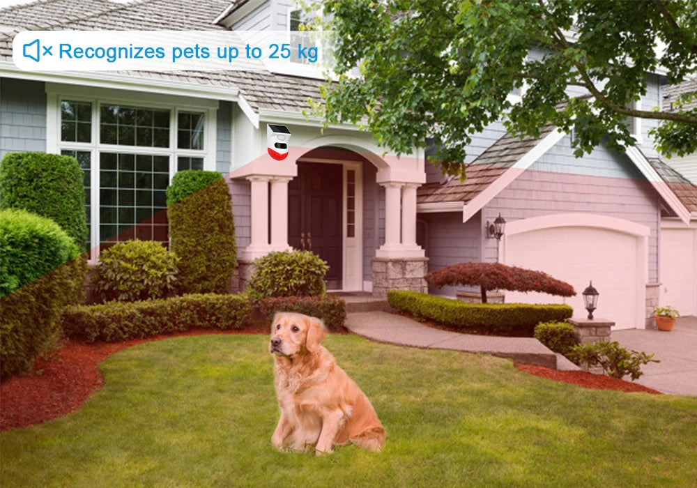 White and red solar-powered wireless motion security alarm mounted on a house exterior, with pet-friendly technology.