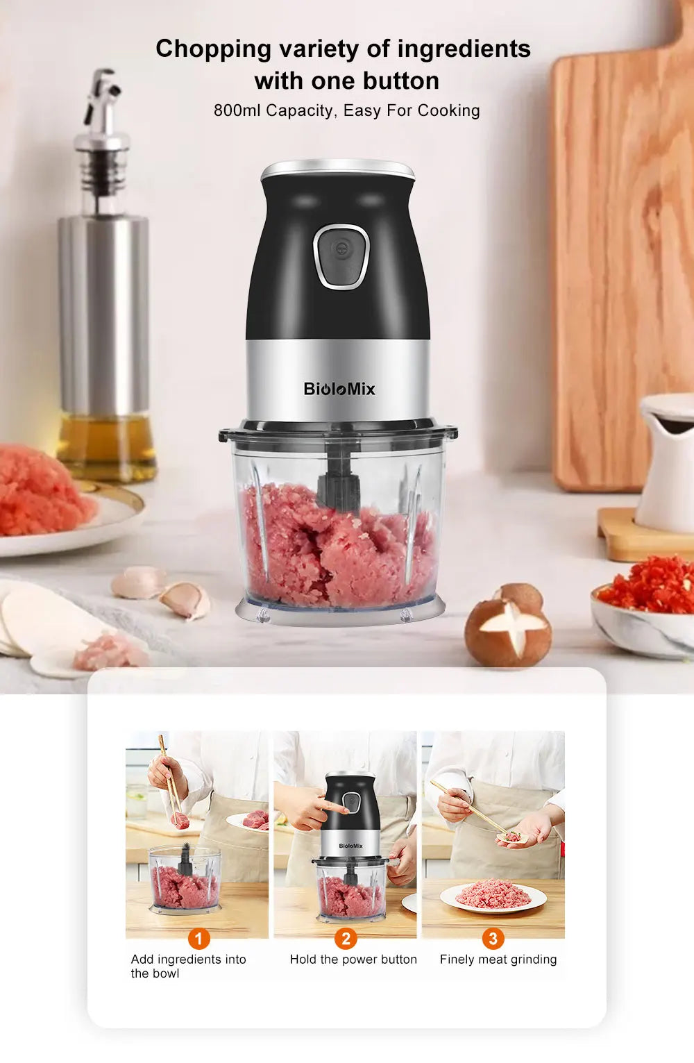 Electric food chopper with a black motor unit, silver base, and clear 800ml bowl on a kitchen counter.