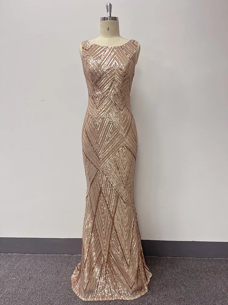 Gold sequin mermaid evening dress with a sleeveless, floor-length silhouette and geometric chevron pattern.