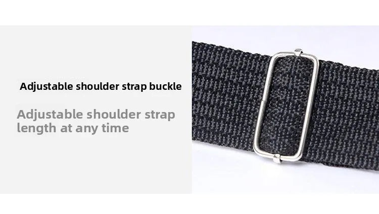 Close-up of a black fabric bag strap with a silver metal adjustable buckle for customising the length.