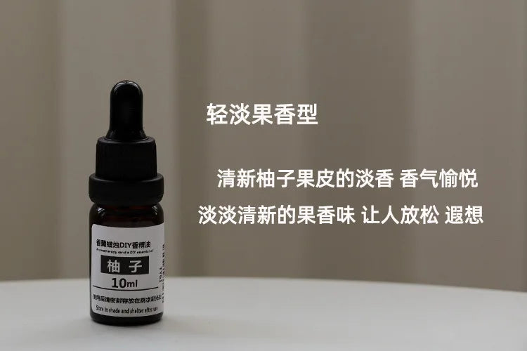 10ml amber glass dropper bottle of grapefruit-scented essential oil for DIY candle making.
