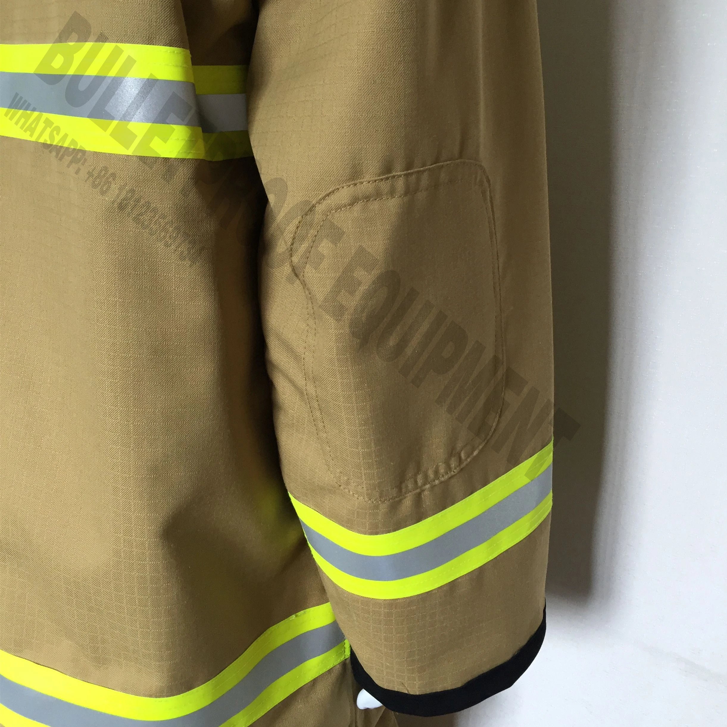 Tan firefighter turnout jacket with high-visibility reflective yellow stripes and reinforced elbow padding.