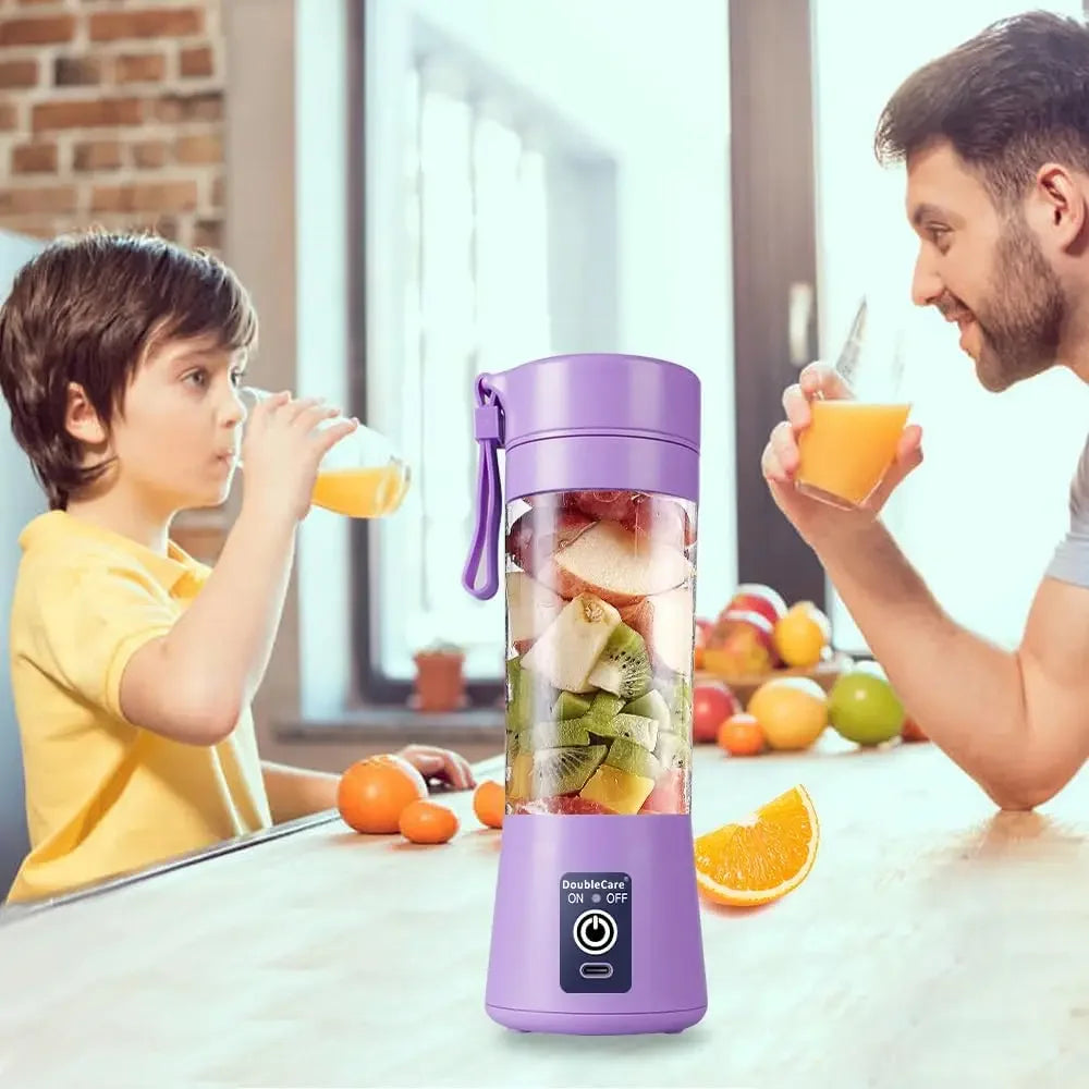 Portable purple personal blender with a clear mixing chamber, carry strap, and power button on the base.