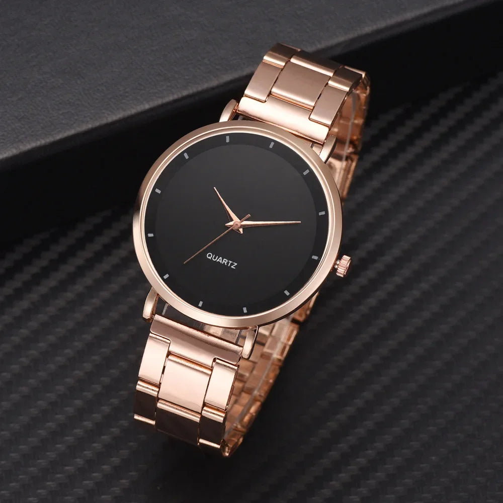 Ladies’ rose gold stainless steel watch with a sleek black minimalist dial and matching link bracelet.