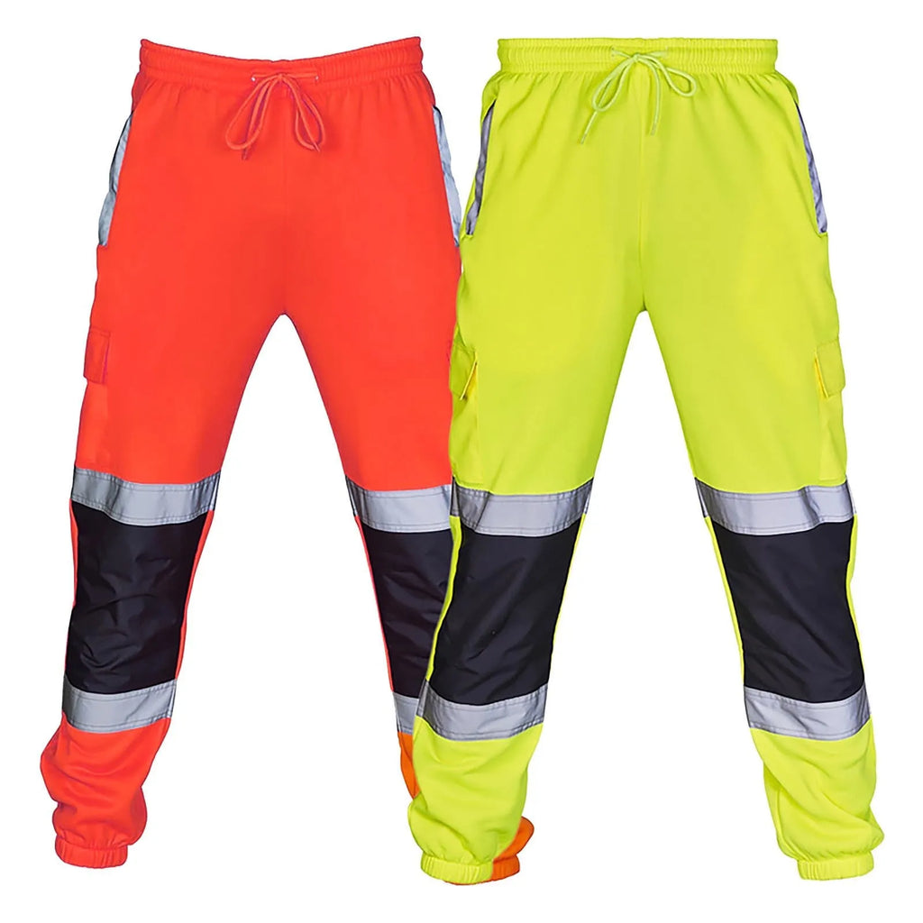 High-visibility drawstring work trousers in orange and yellow, featuring reflective tape and black contrast knee panels.