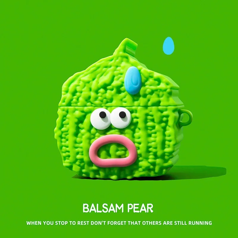 Green silicone AirPods case shaped like a quirky Balsam Pear character with googly eyes and a pink mouth.