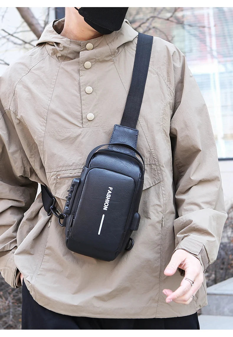 Black faux-leather anti-theft sling bag with a USB charging port, worn across the chest.