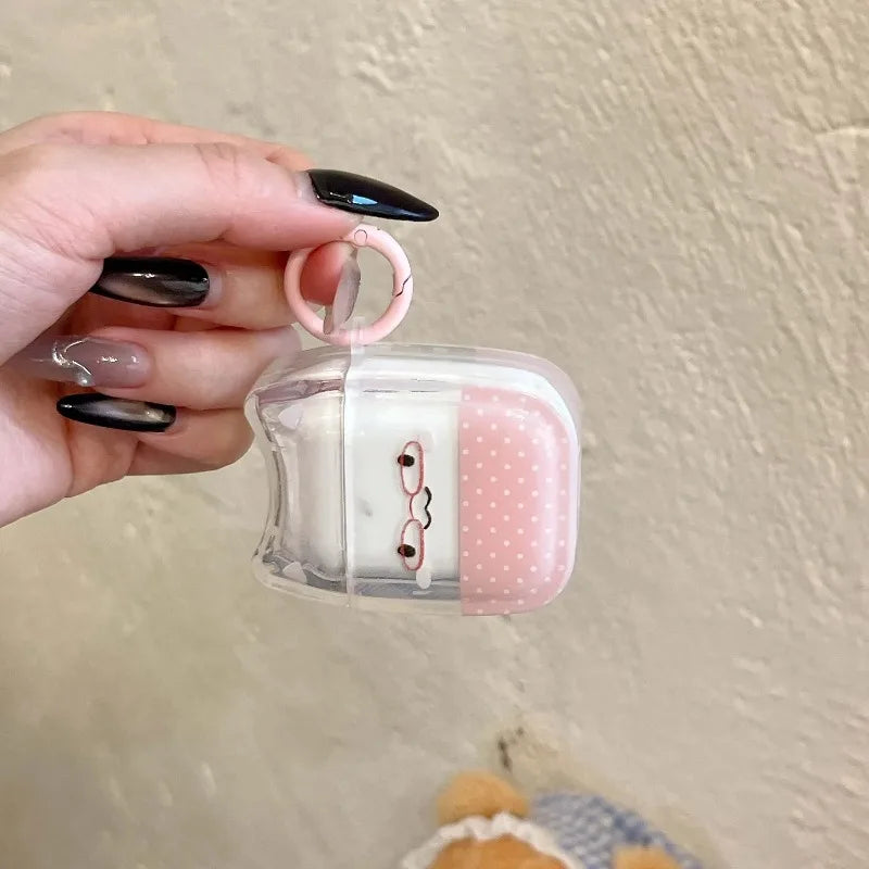 Clear, pink polka-dot AirPods Pro case with a cute character design and matching ring attachment.