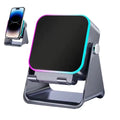 Dark grey portable Bluetooth speaker with integrated phone stand and vibrant RGB light ring.