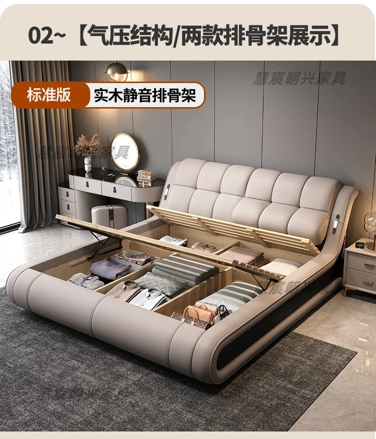 Modern, light grey genuine leather bed frame with an open gas-lift storage base and a tufted, curved headboard.
