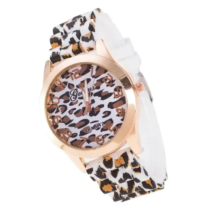 Women's casual quartz watch with a white and brown leopard print silicone strap and a rose-gold tone round dial.