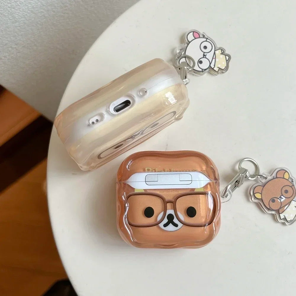 Clear, brown Rilakkuma-themed silicone AirPod case with character charm. Compatible with AirPods Pro.