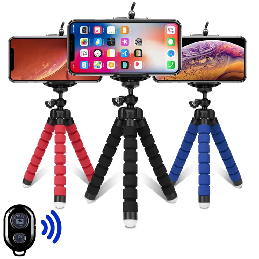 Three flexible, adjustable phone tripods in red, black, and blue, each with a smartphone and wireless remote shutter.