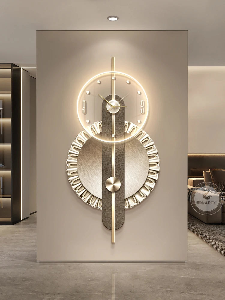 Modern gold and charcoal geometric LED wall clock with a circular light-up face and elegant, layered metallic design.