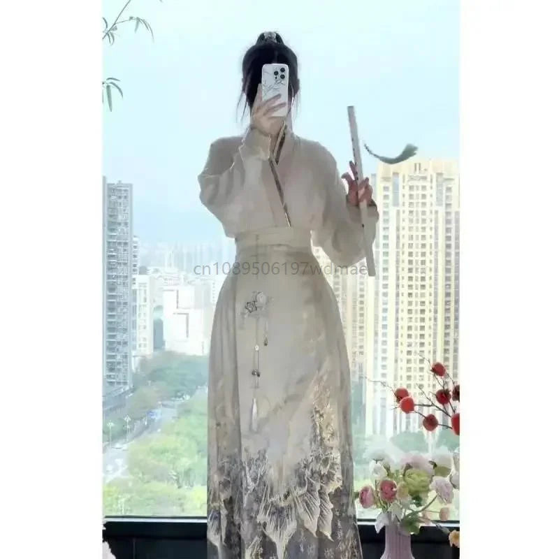 Woman in an elegant, cream-coloured traditional Hanfu dress with floral embroidery and a flowing, dark patterned hem.