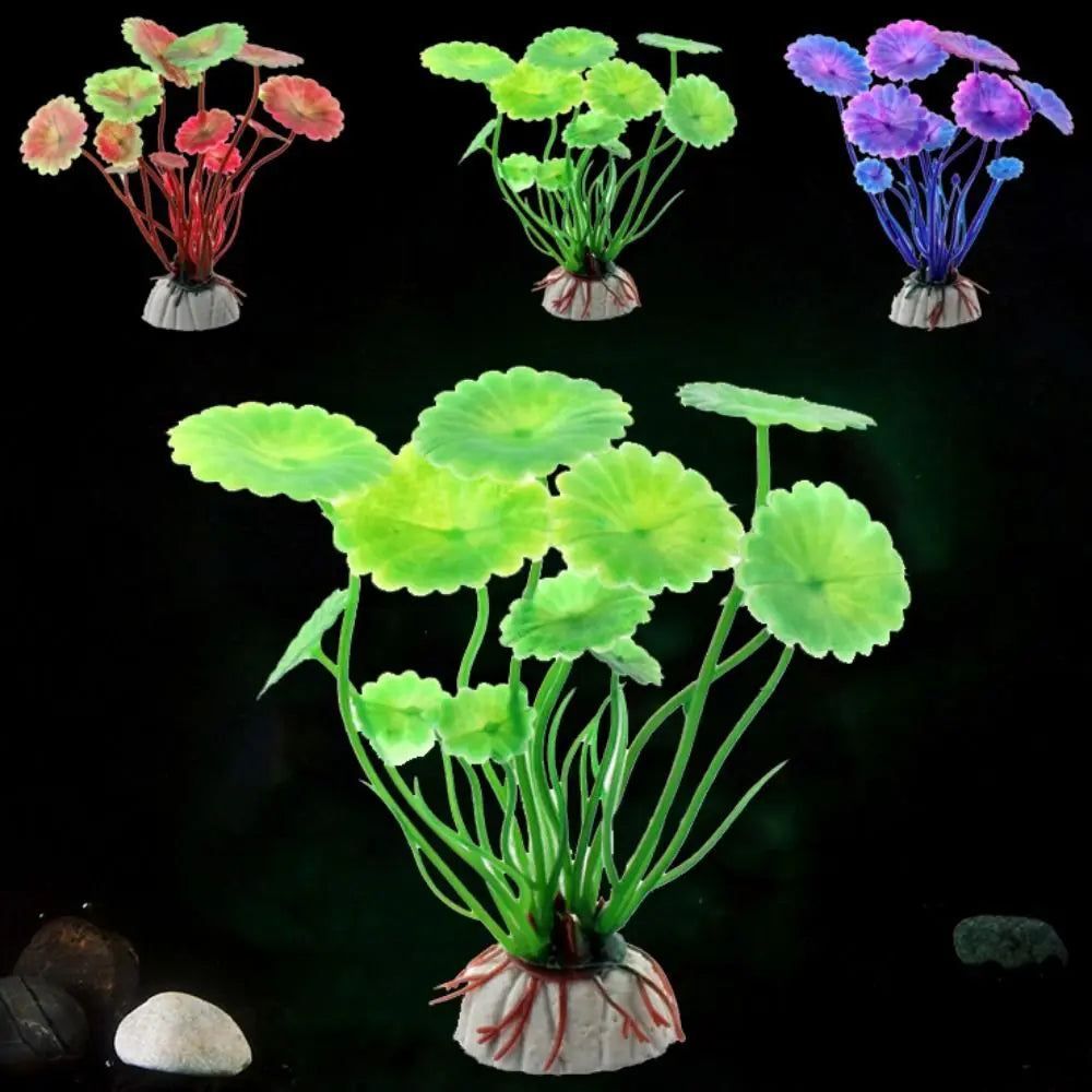 Four artificial aquarium plants with round leaves in green, red, and purple, each set on a small, heavy gray base.