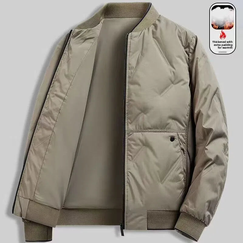 Beige men’s zip-up bomber jacket with ribbed cuffs, quilted detailing, and thick padding for warmth.