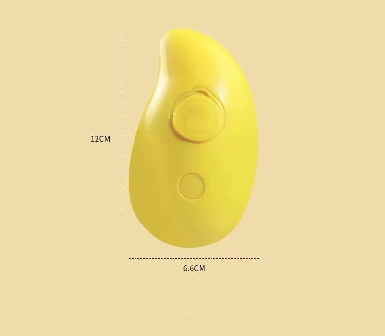 Yellow, mango-shaped portable electric hand warmer with circular control button, measuring 12cm by 6.6cm.