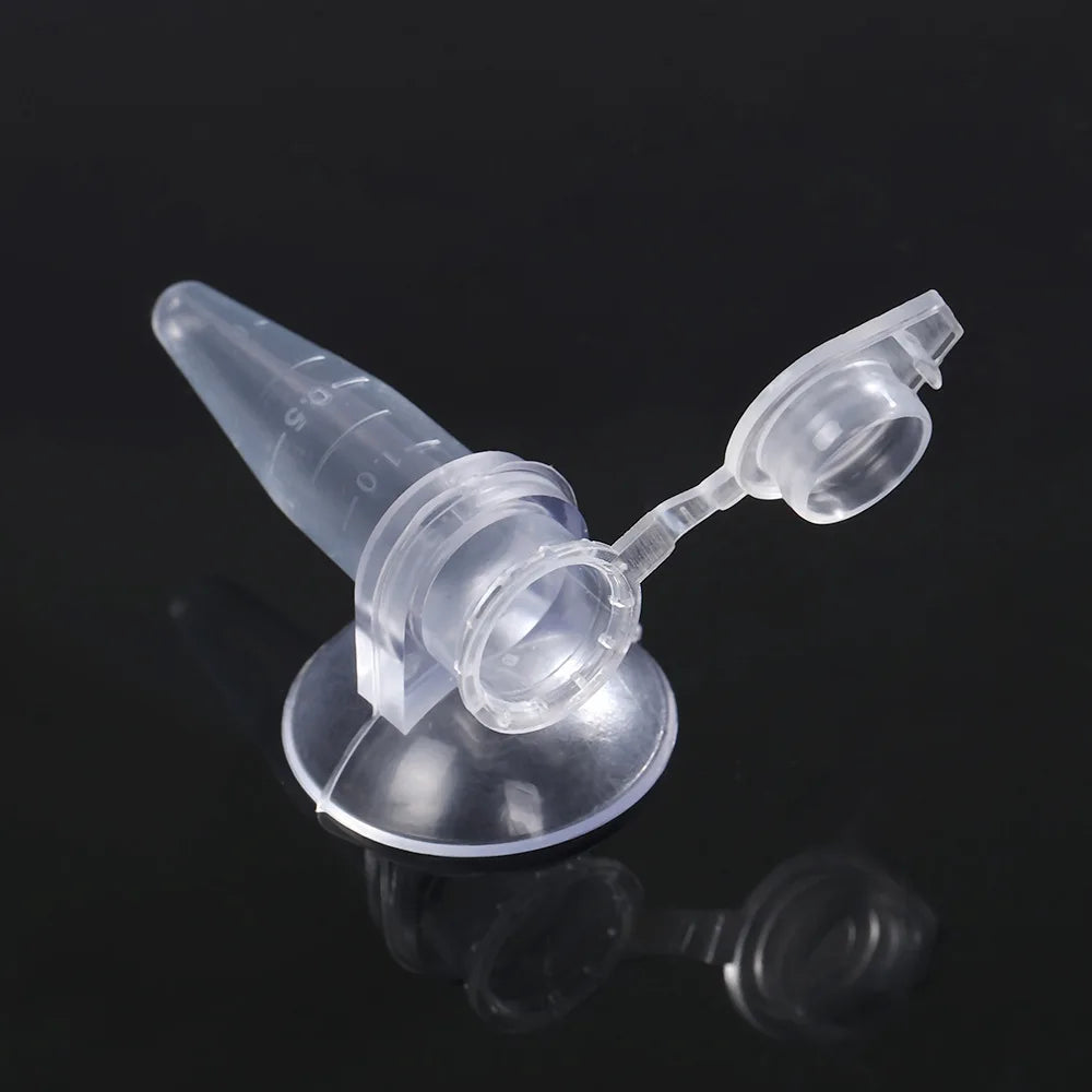 Clear plastic conical centrifuge tube with an open hinged lid and suction cup base on a black background.
