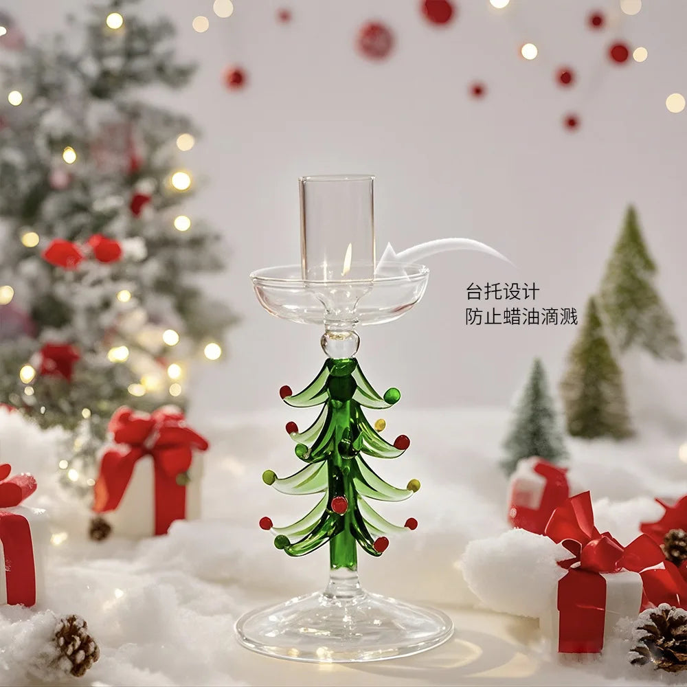 Clear glass borosilicate candlestick holder shaped like a green Christmas tree with red and yellow ornament details.