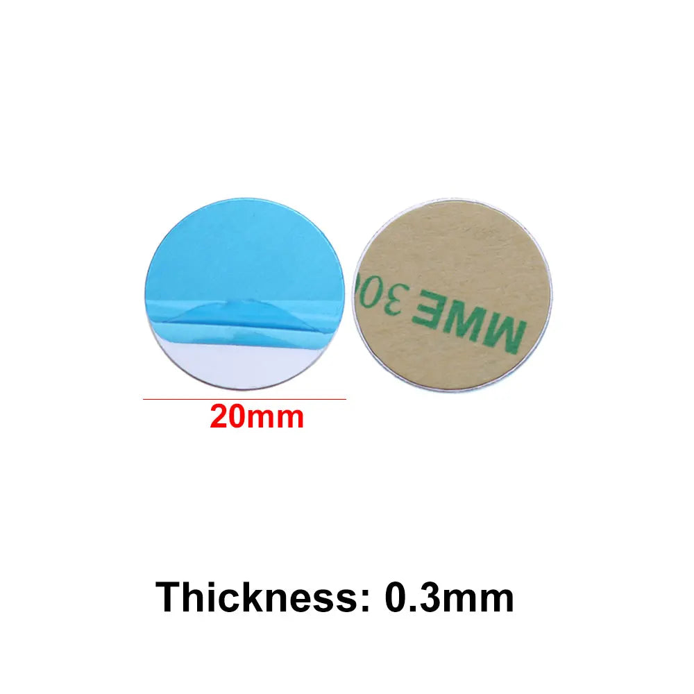 Two 20mm round, 0.3mm thick adhesive pads, shown from both the blue peel-off side and the tan adhesive side.